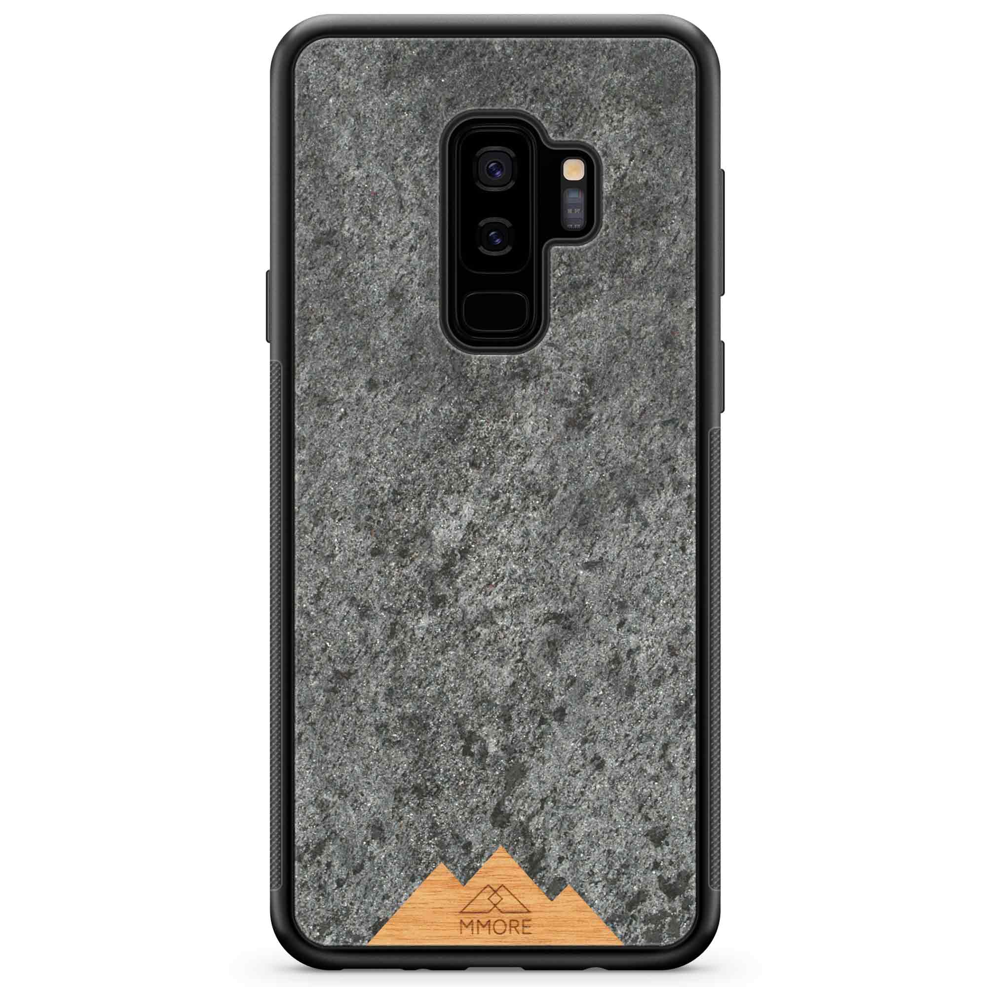 Mountain Stone Phone Case showcasing unique natural texture and sparkly grey color, held in hand against a natural backdrop.