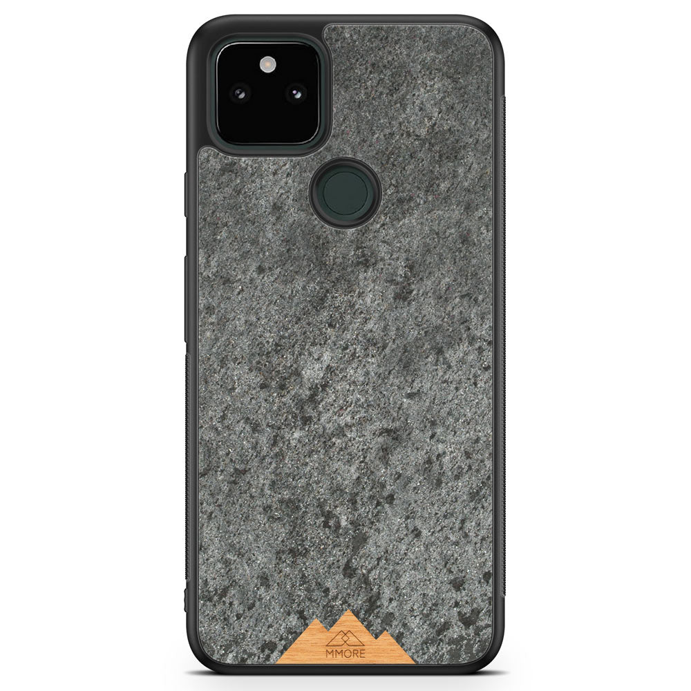 Mountain Stone Phone Case showcasing unique natural texture and sparkly grey color, held in hand against a natural backdrop.