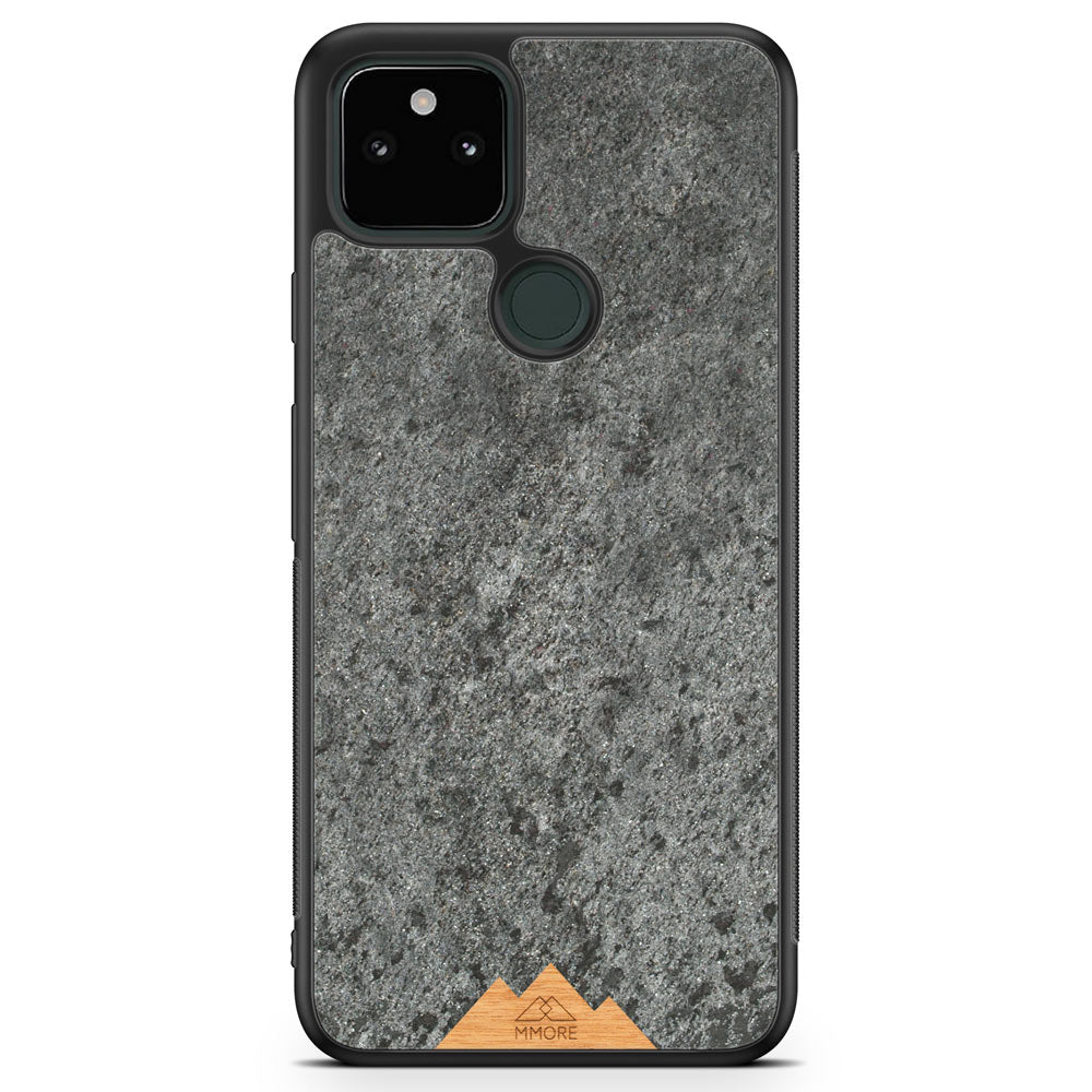 Mountain Stone Phone Case showcasing unique natural texture and sparkly grey color, held in hand against a natural backdrop.