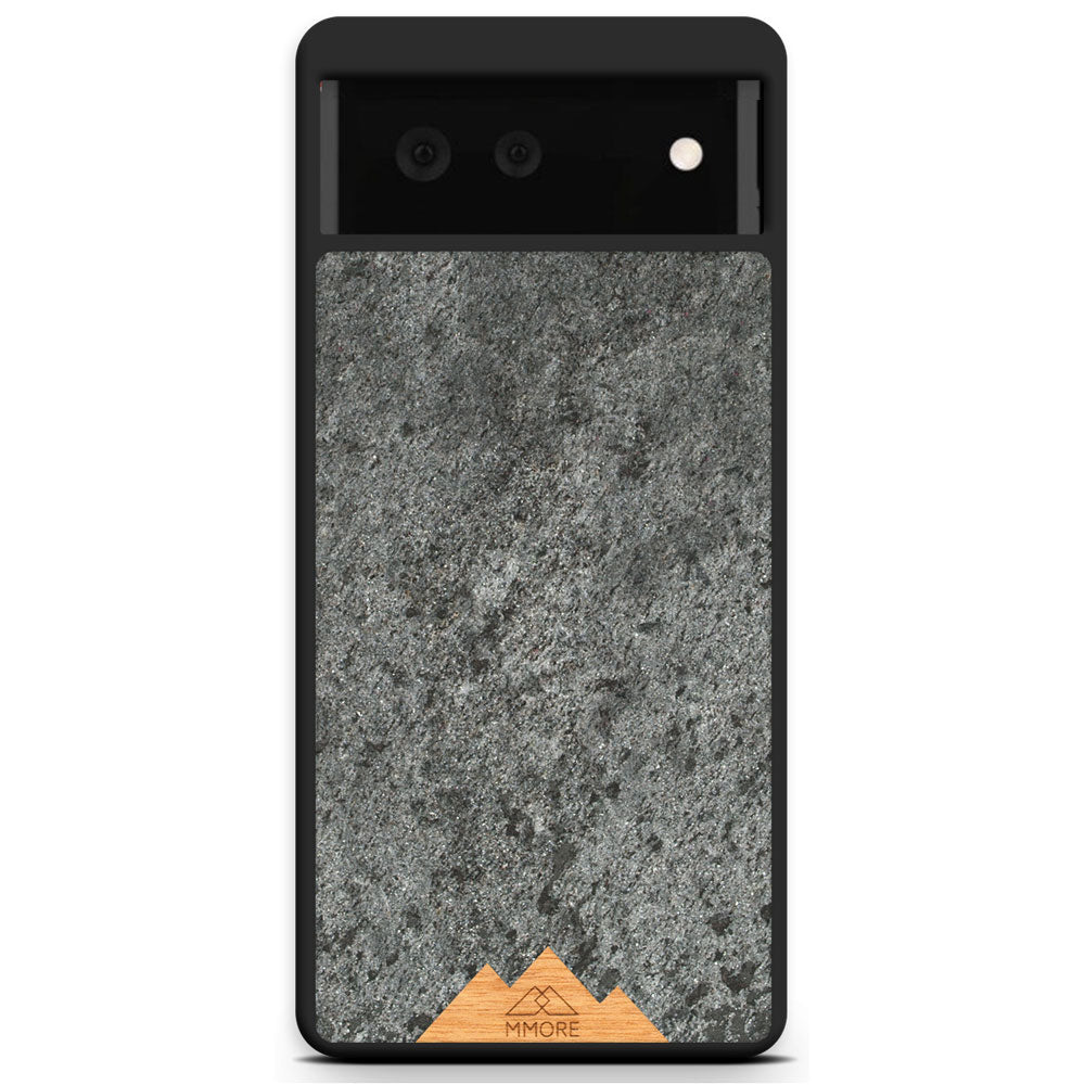 Mountain Stone Phone Case showcasing unique natural texture and sparkly grey color, held in hand against a natural backdrop.