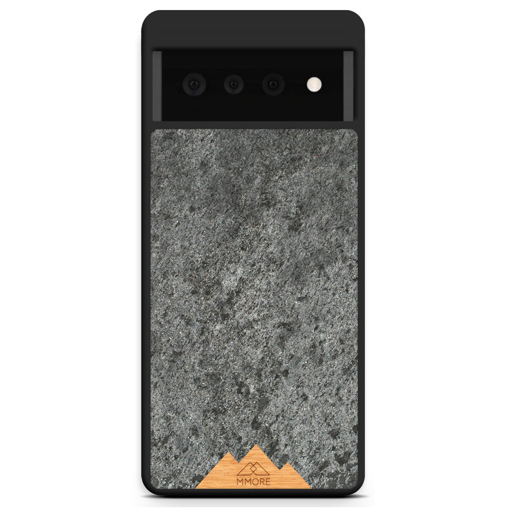 Mountain Stone Phone Case showcasing unique natural texture and sparkly grey color, held in hand against a natural backdrop.