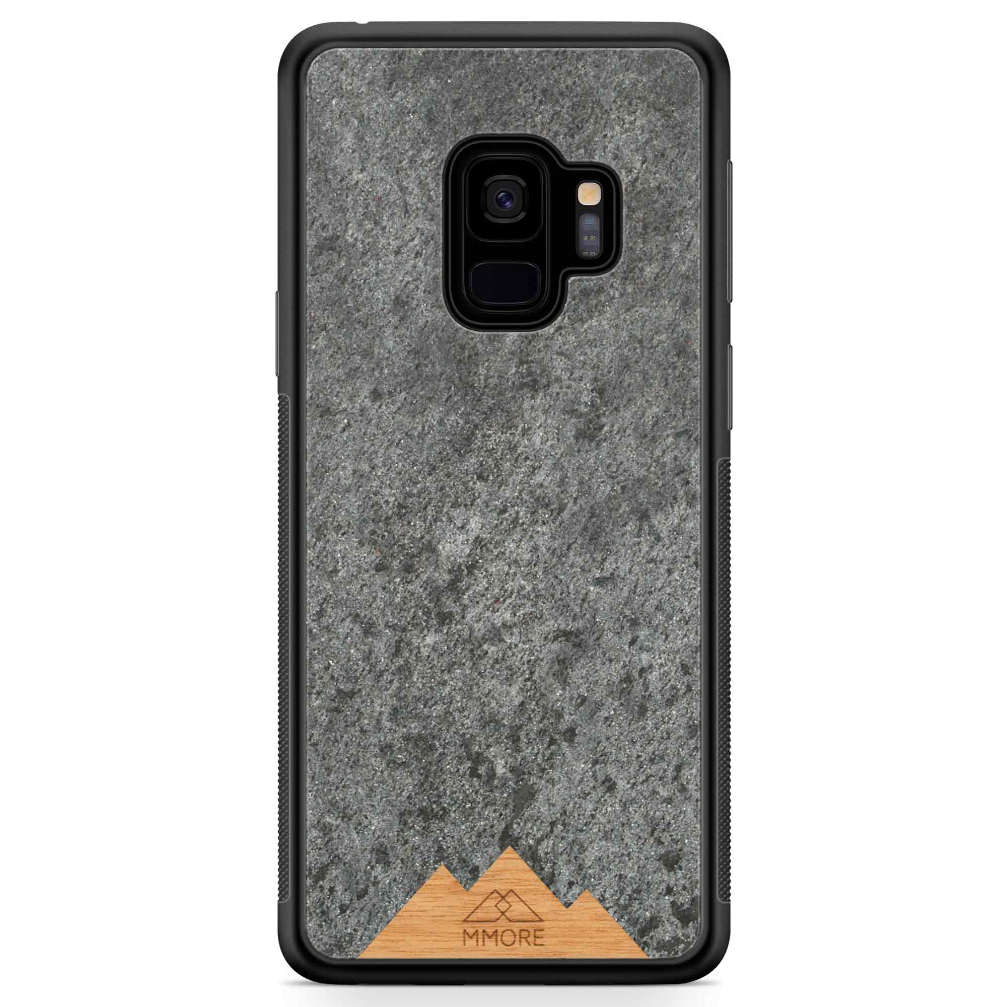 Mountain Stone Phone Case showcasing unique natural texture and sparkly grey color, held in hand against a natural backdrop.