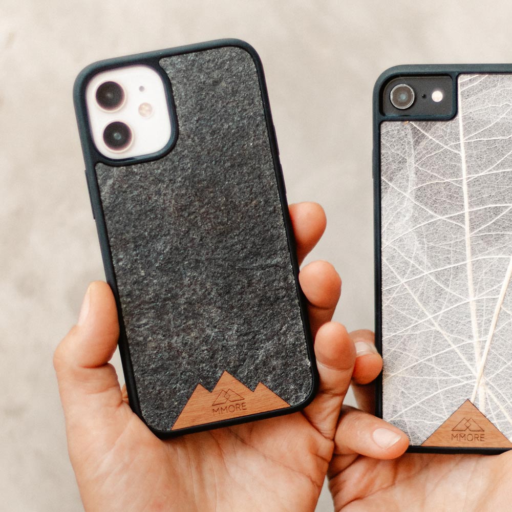 Mountain Stone Phone Case showcasing unique natural texture and sparkly grey color, held in hand against a natural backdrop.