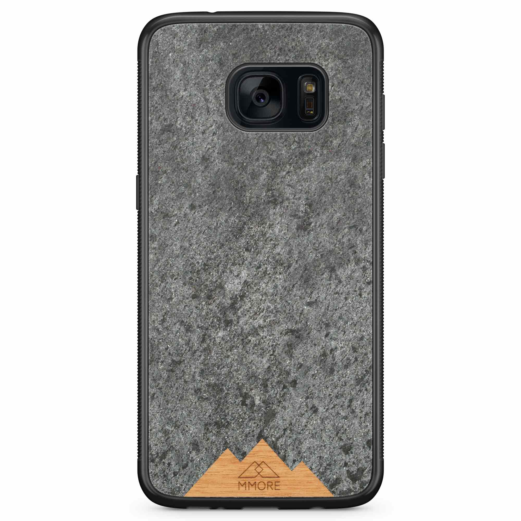 Mountain Stone Phone Case showcasing unique natural texture and sparkly grey color, held in hand against a natural backdrop.