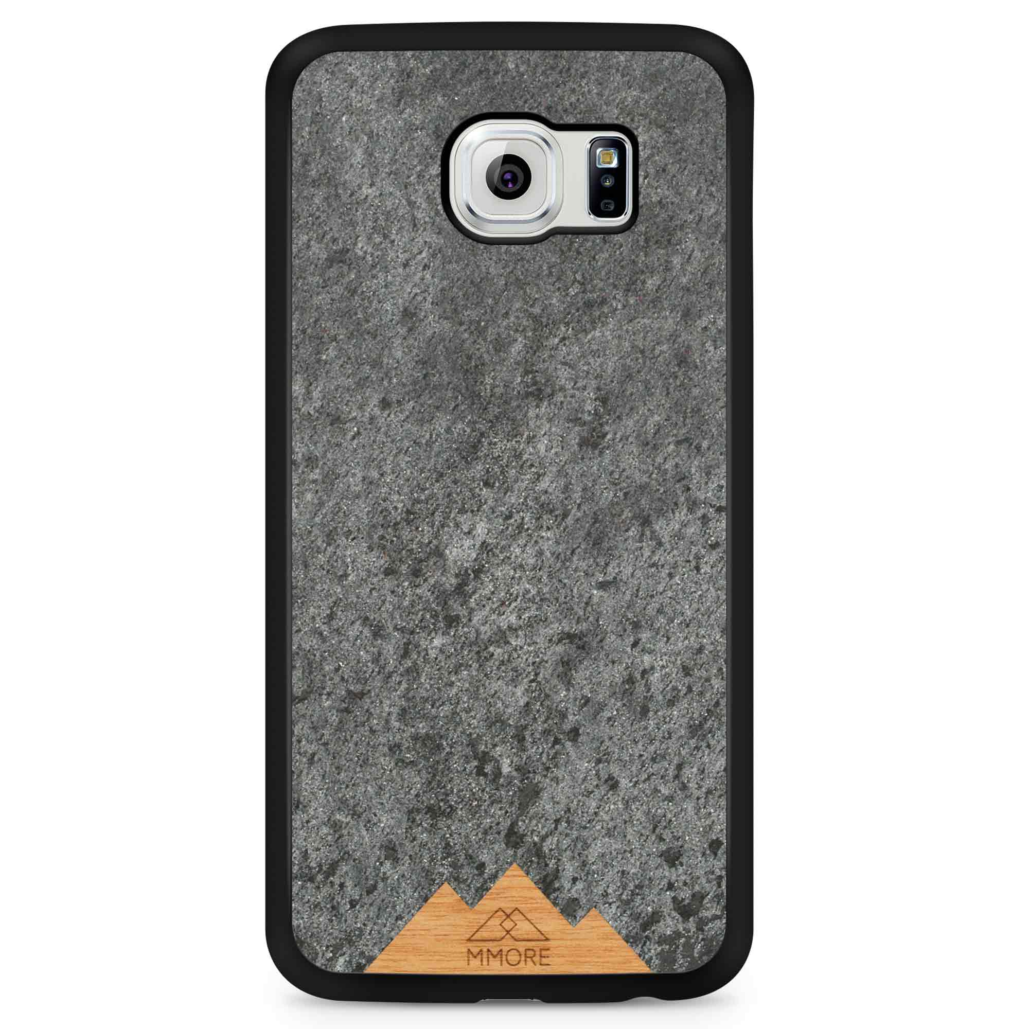 Mountain Stone Phone Case showcasing unique natural texture and sparkly grey color, held in hand against a natural backdrop.