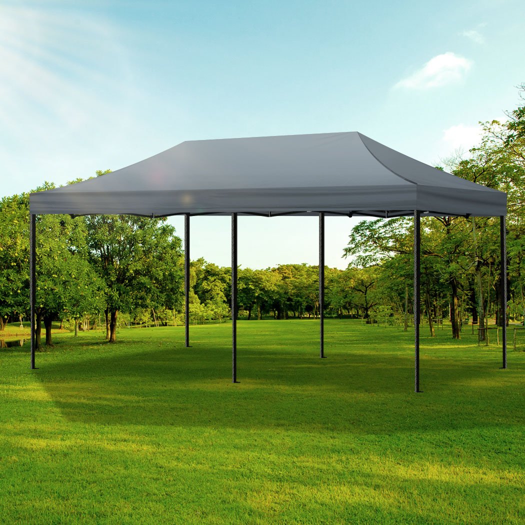 Mountview Gazebo Tent 3x6 with dark grey fabric and steel frame, set up outdoors providing shade and protection.