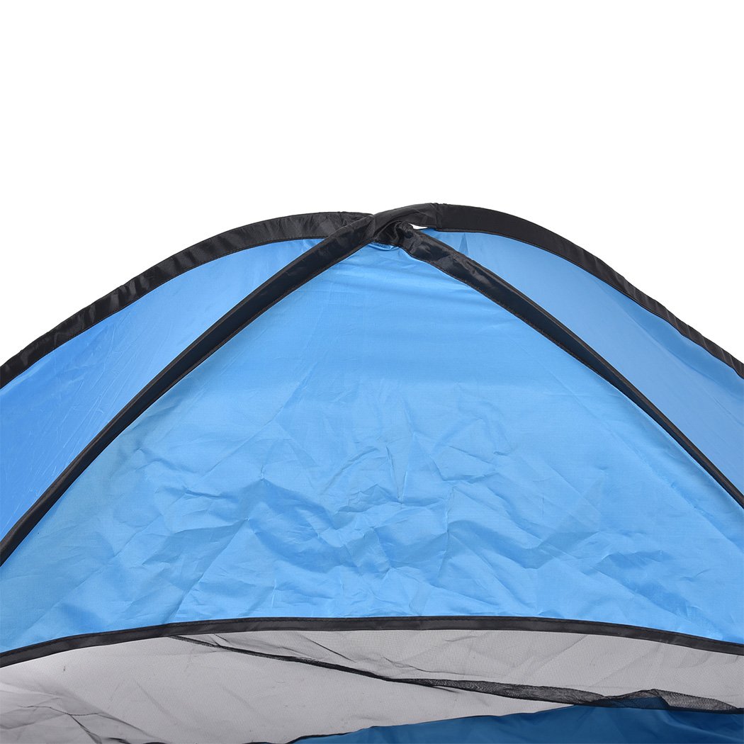 Mountview Pop Up Beach Tent for 2 persons, featuring a blue design, interwoven mesh, and a carry bag, ideal for outdoor activities.