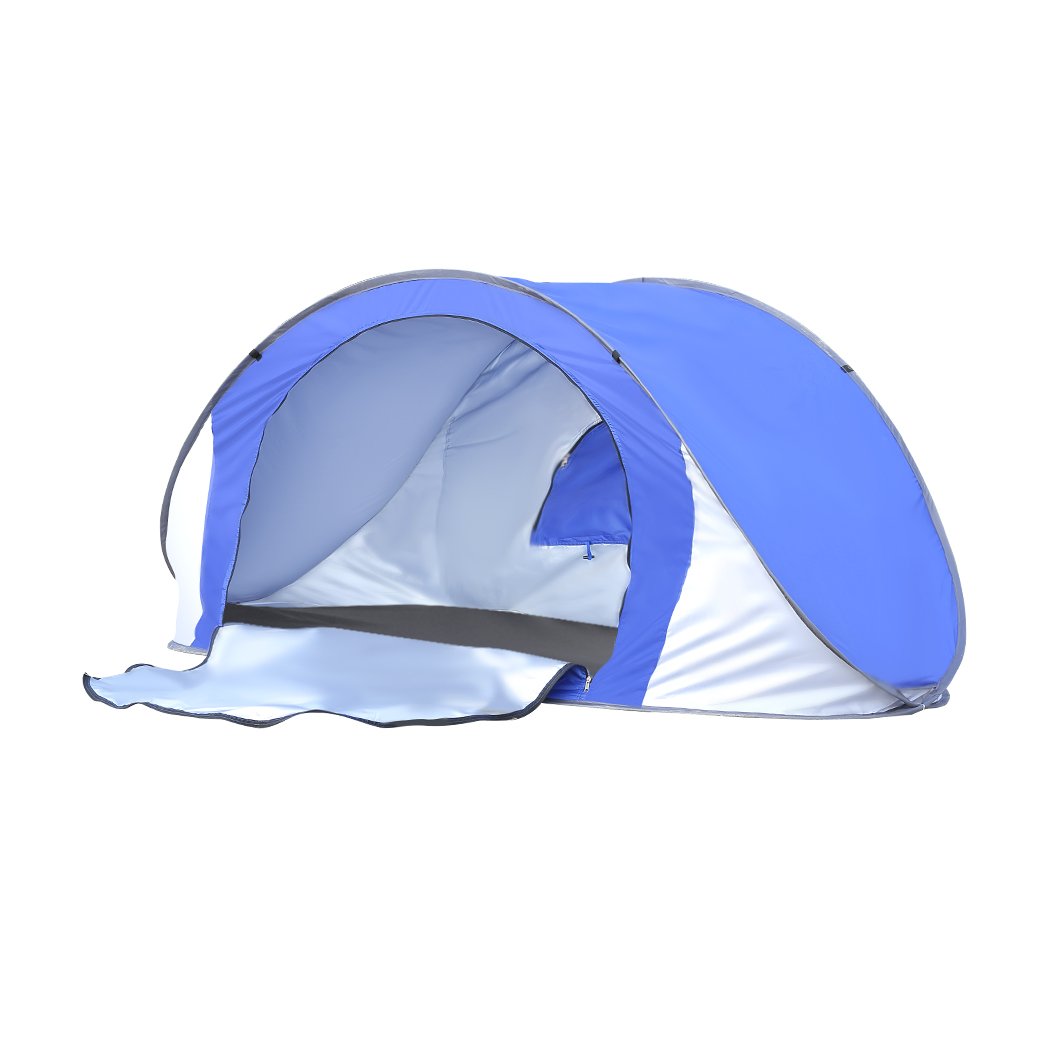 Mountview Pop Up Tent in blue color set up on the beach, showcasing its spacious interior and automatic opening feature.