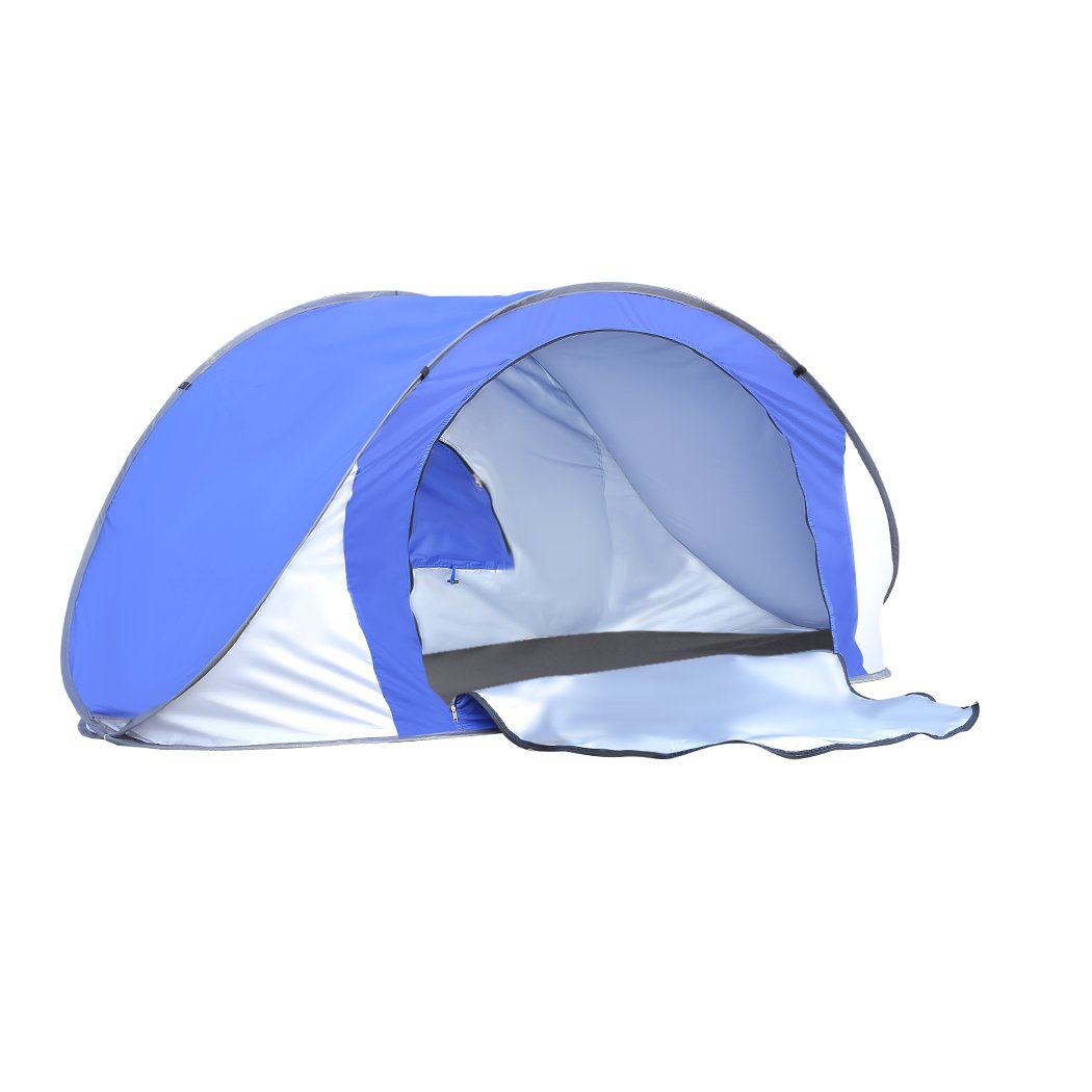 Mountview Pop Up Tent in blue color set up on the beach, showcasing its spacious interior and automatic opening feature.