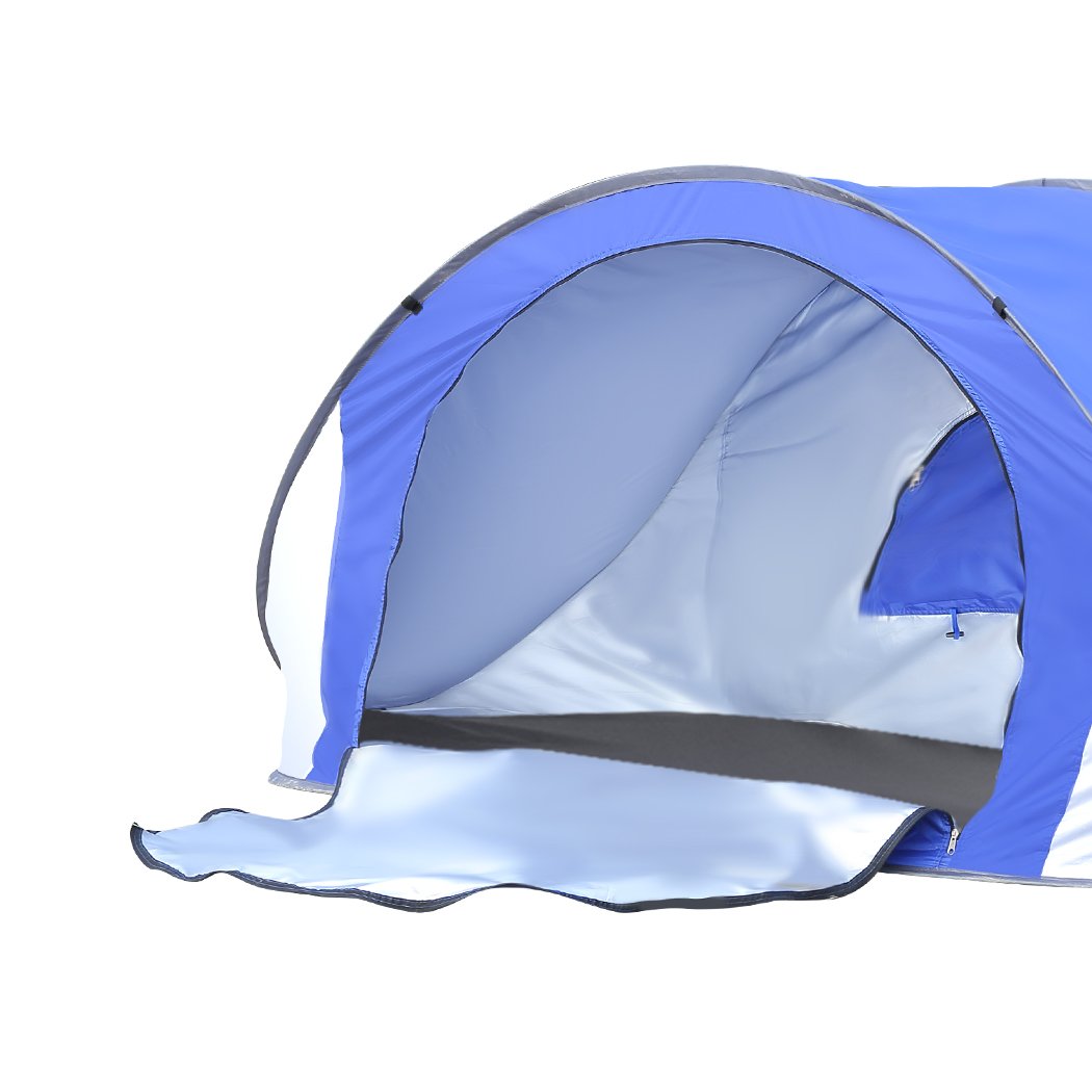 Mountview Pop Up Tent in blue color set up on the beach, showcasing its spacious interior and automatic opening feature.