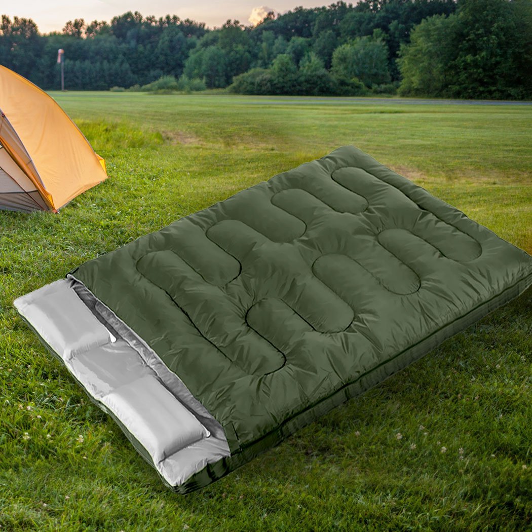 Mountview Double Sleeping Bag in army green, designed for outdoor camping, featuring two pillows and a carry bag.