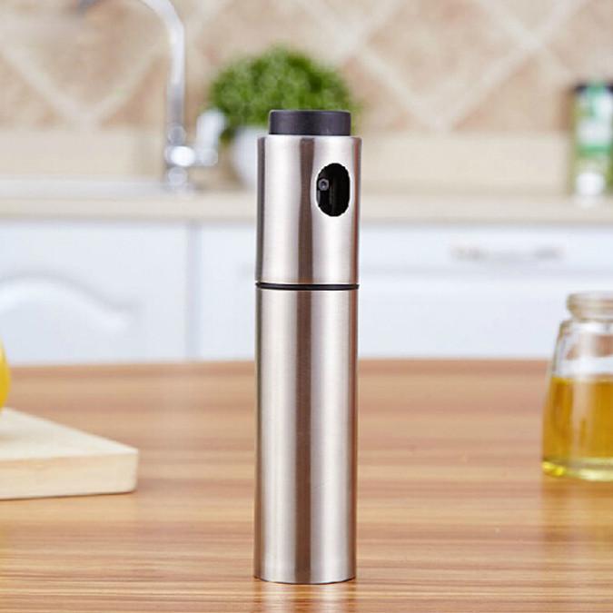 Mr. Mister Point And Spray Olive Oil Spritzer in stainless steel with a BPA-free plastic inner shell, designed for easy oil spraying.