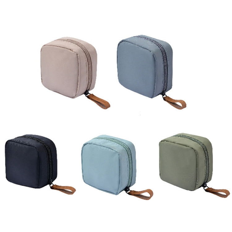 Multifunctional waterproof portable sanitary storage bags in a stylish design, showcasing their compact size and durable nylon material.