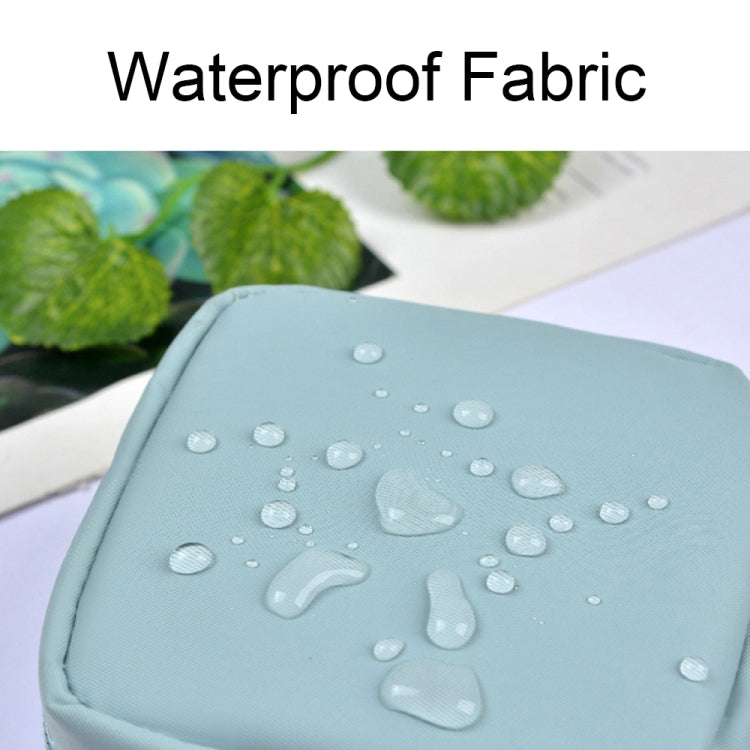 Multifunctional waterproof portable sanitary storage bags in a stylish design, showcasing their compact size and durable nylon material.