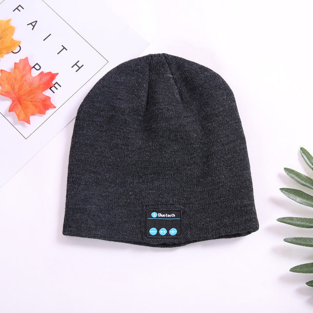 A stylish Musical Beanie Bluetooth Hat in various colors, featuring built-in speakers and a microphone for hands-free calling and music control.