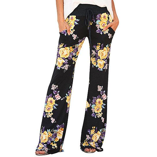 A pair of super cute rosy jammies featuring a comfortable design with adjustable drawstrings and a fold-over waistband, perfect for lounging.