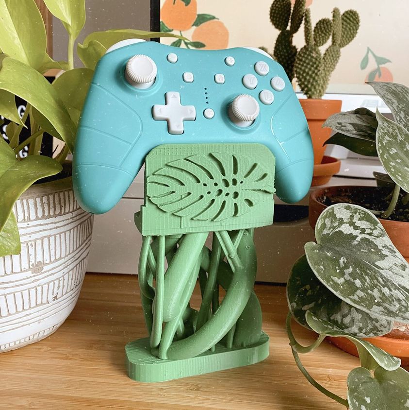 Nature Controller Stand designed for Xbox One and Switch controllers, featuring a compact and stylish design.