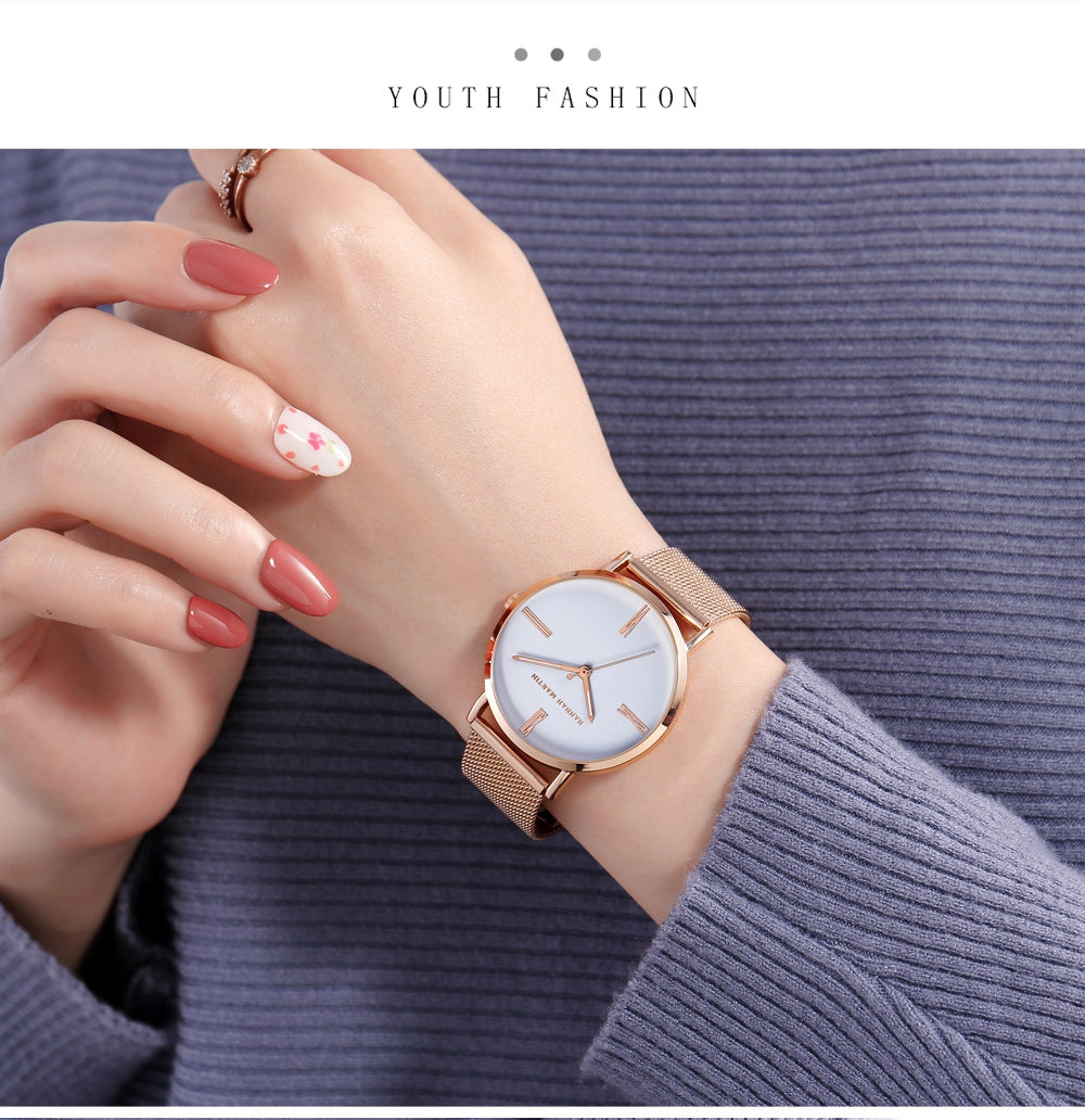 Stylish women's watch featuring a stainless steel mesh band and a round alloy case with a hardlex dial, showcasing a minimalist design.