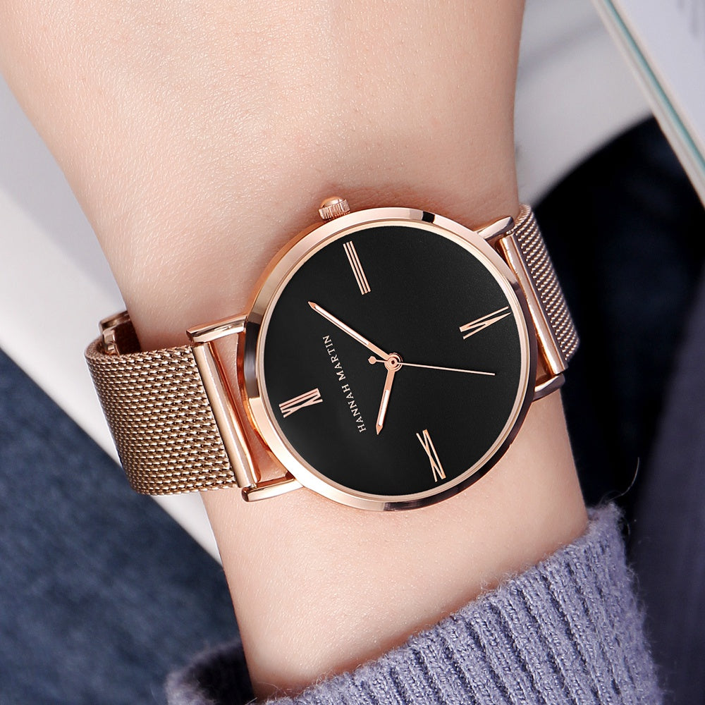 Stylish women's watch featuring a stainless steel mesh band and a round alloy case with a hardlex dial, showcasing a minimalist design.