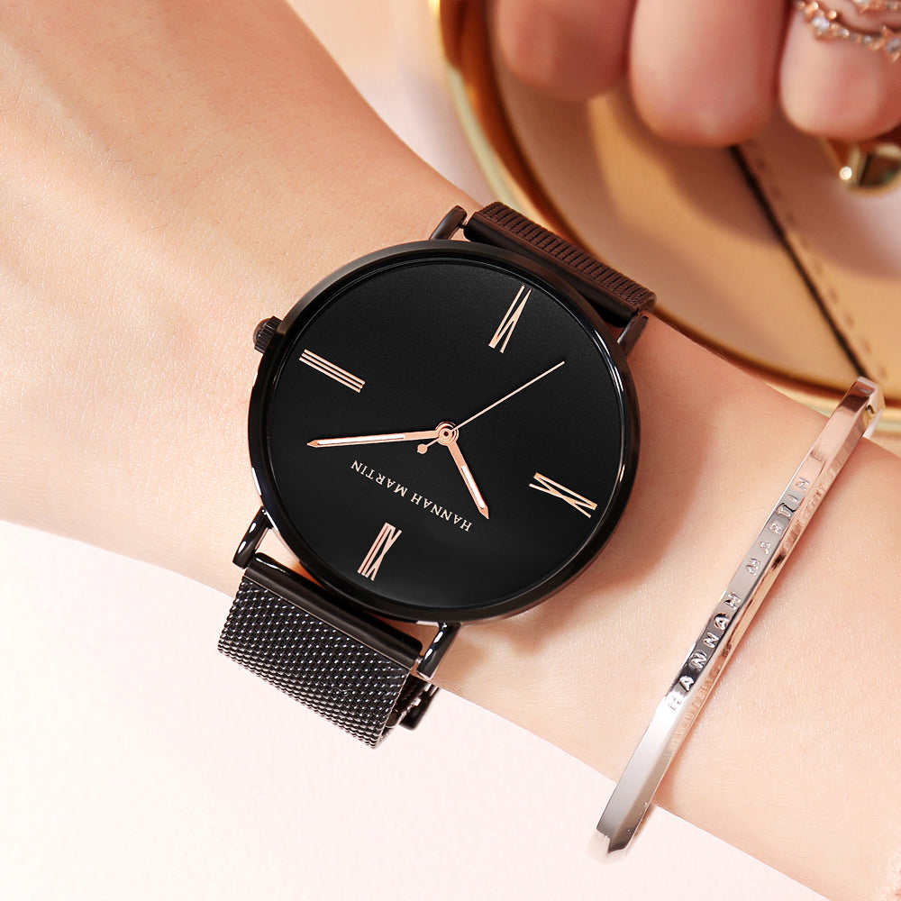 Stylish women's watch featuring a stainless steel mesh band and a round alloy case with a hardlex dial, showcasing a minimalist design.