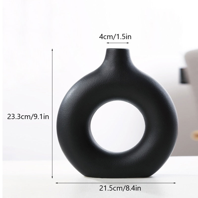 Nordic Ceramic Vase with circular hollow design, showcasing its elegant craftsmanship and smooth finish.