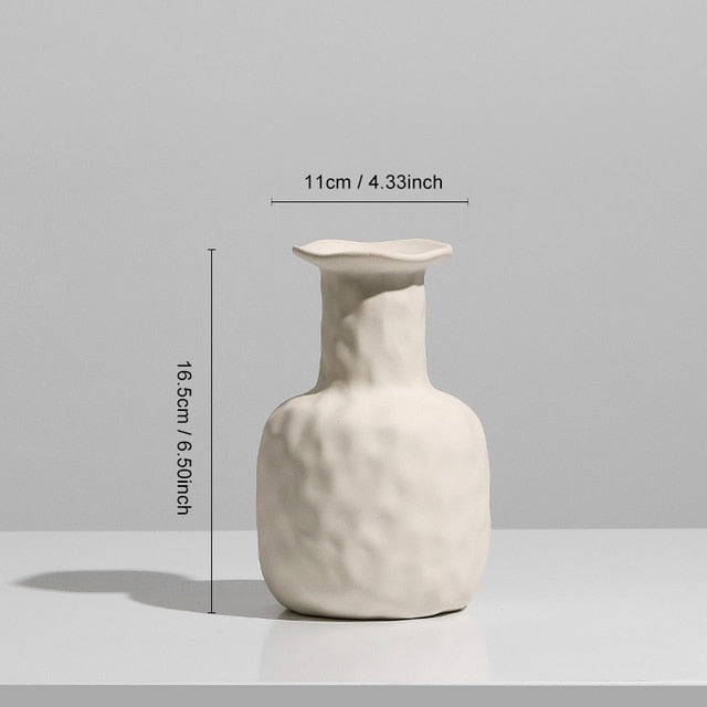 Nordic Ceramic Vase with circular hollow design, showcasing its elegant craftsmanship and smooth finish.