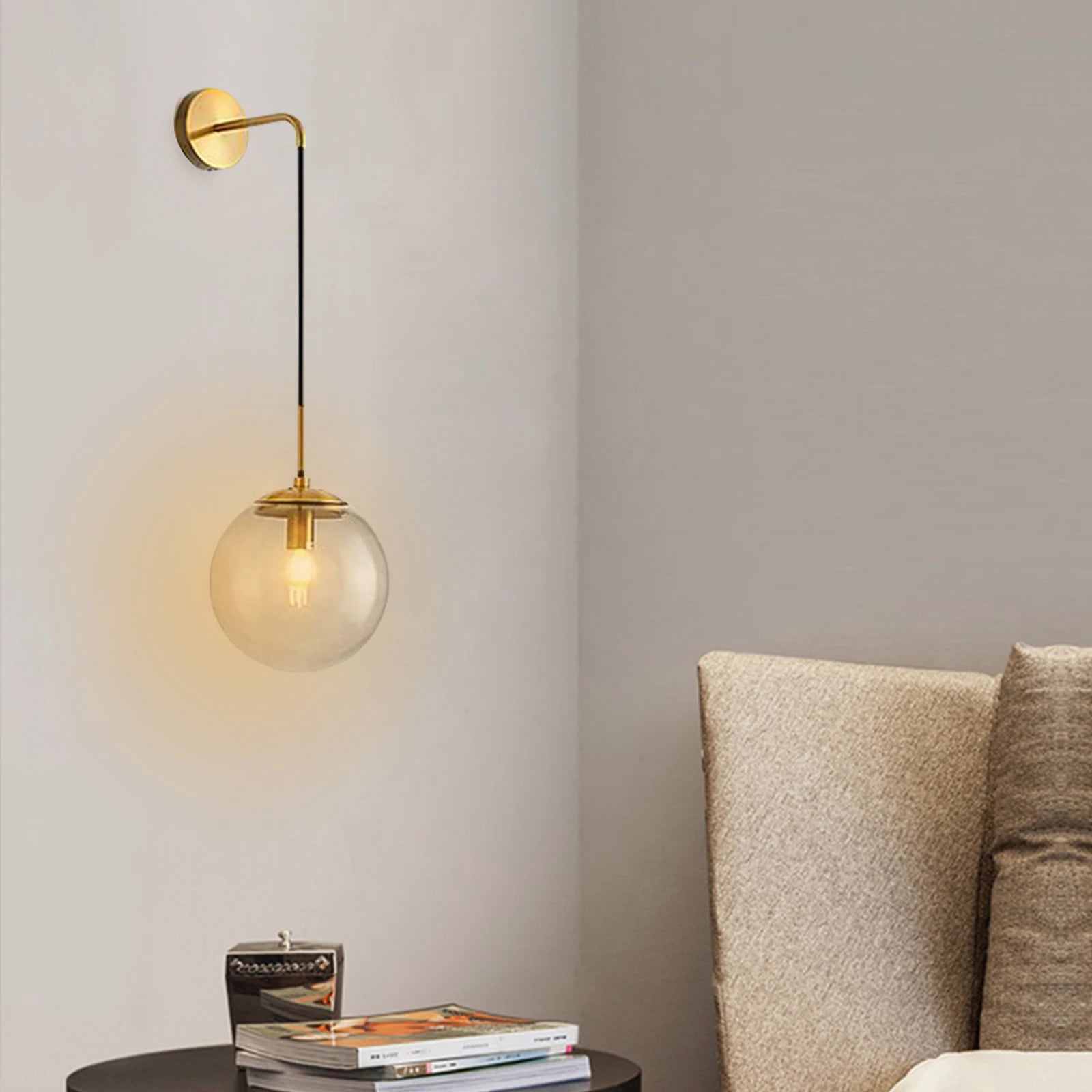 Nordic Glass Ball Wall Light featuring a black and gold finish with a clear glass globe shade, ideal for modern interiors.