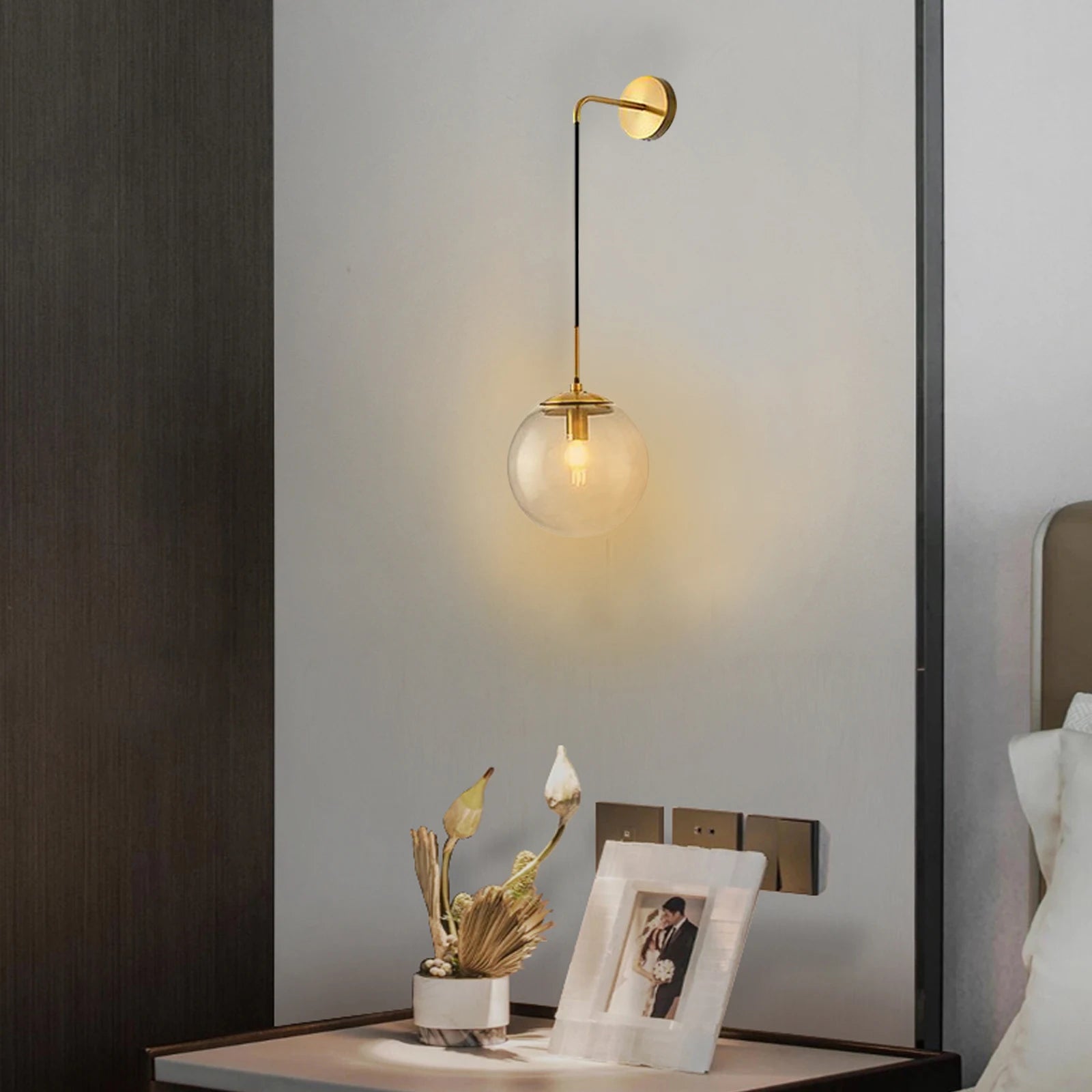 Nordic Glass Ball Wall Light featuring a black and gold finish with a clear glass globe shade, ideal for modern interiors.