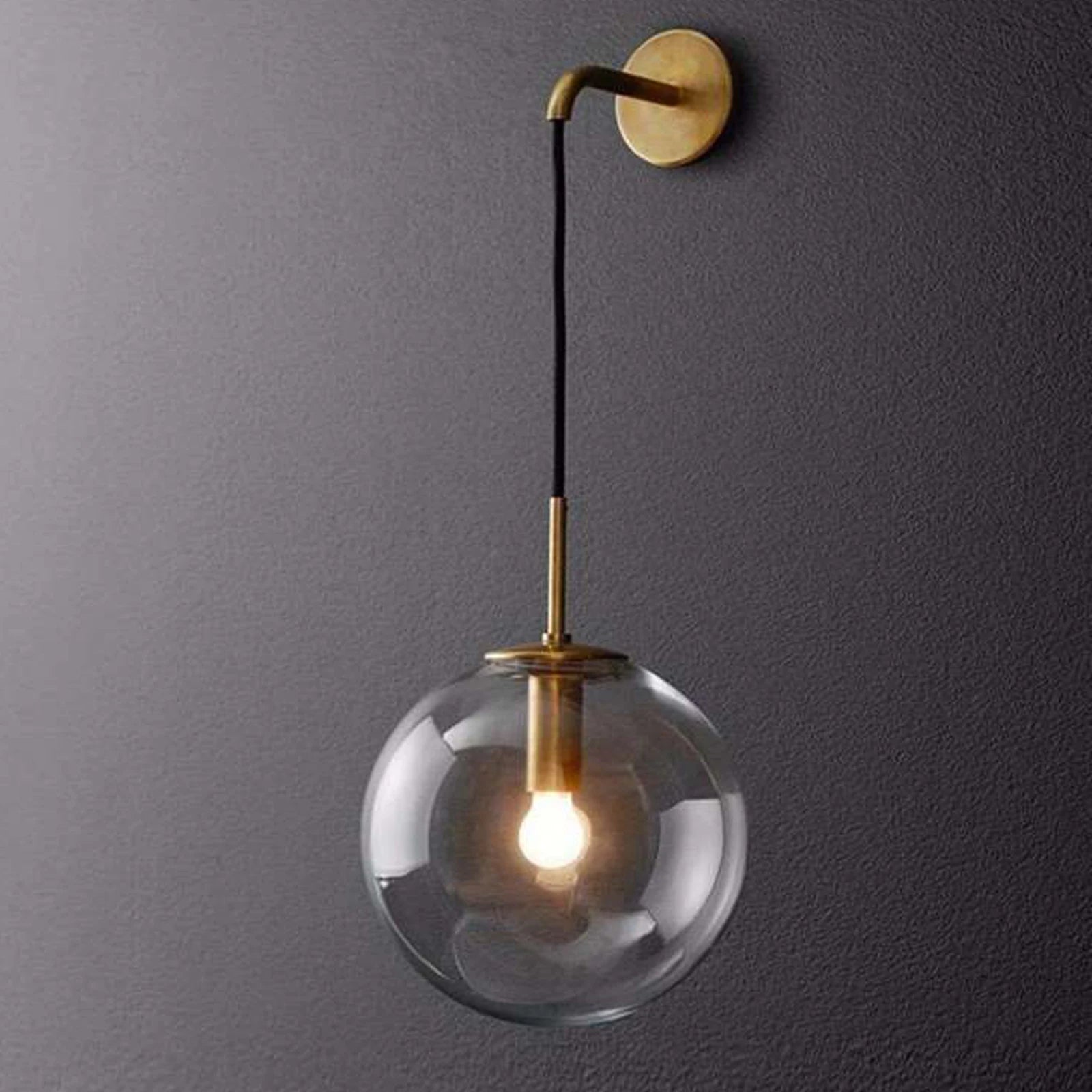 Nordic Glass Ball Wall Light featuring a black and gold finish with a clear glass globe shade, ideal for modern interiors.