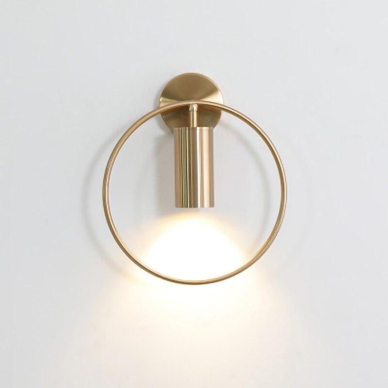 Nordic Minimalism GU10 LED wall lamp in black and gold, showcasing its sleek design and round shade, perfect for indoor lighting.