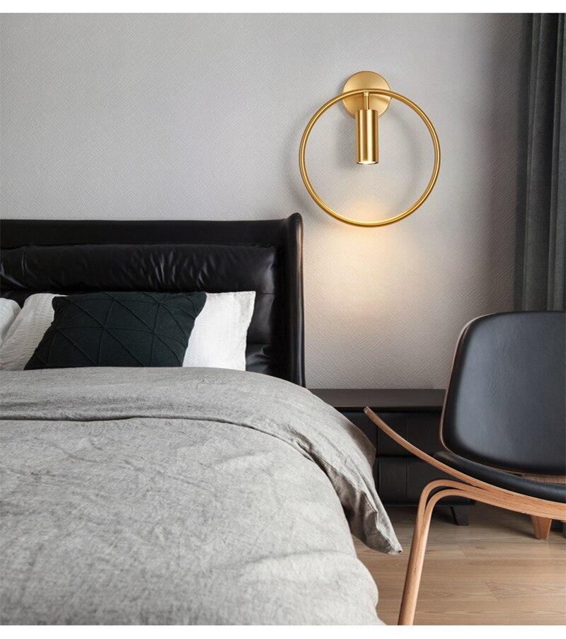 Nordic Minimalism GU10 LED wall lamp in black and gold, showcasing its sleek design and round shade, perfect for indoor lighting.