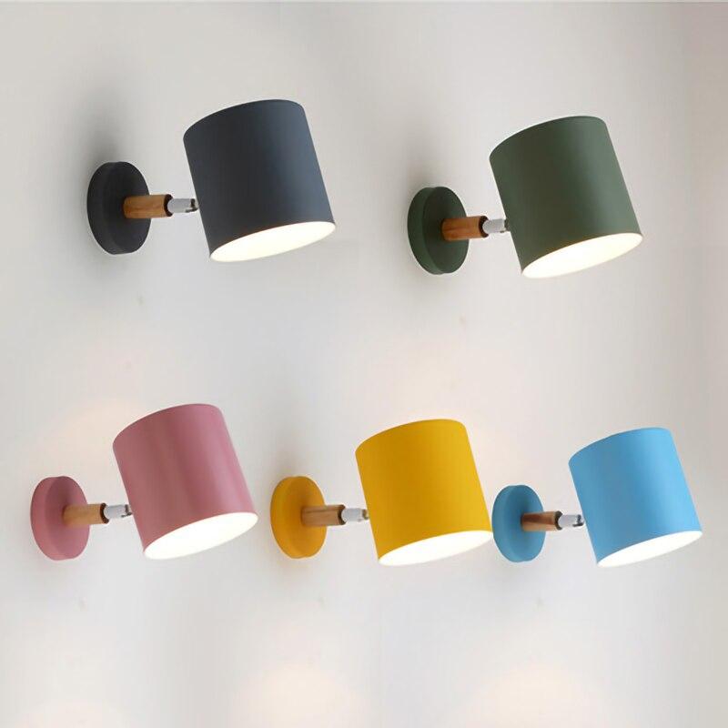 Nordic modern E27 LED wall lamp in various colors, showcasing its adjustable design and modern aesthetic.