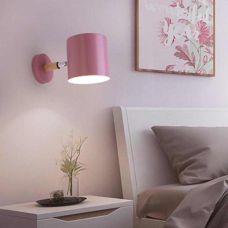 Nordic modern E27 LED wall lamp in various colors, showcasing its adjustable design and modern aesthetic.