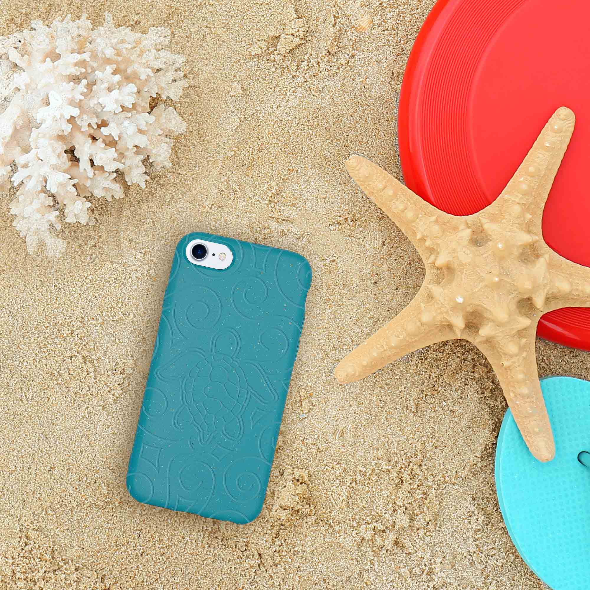 Ocean Turtle biodegradable phone case in ocean blue and black, showcasing its eco-friendly design and texture.