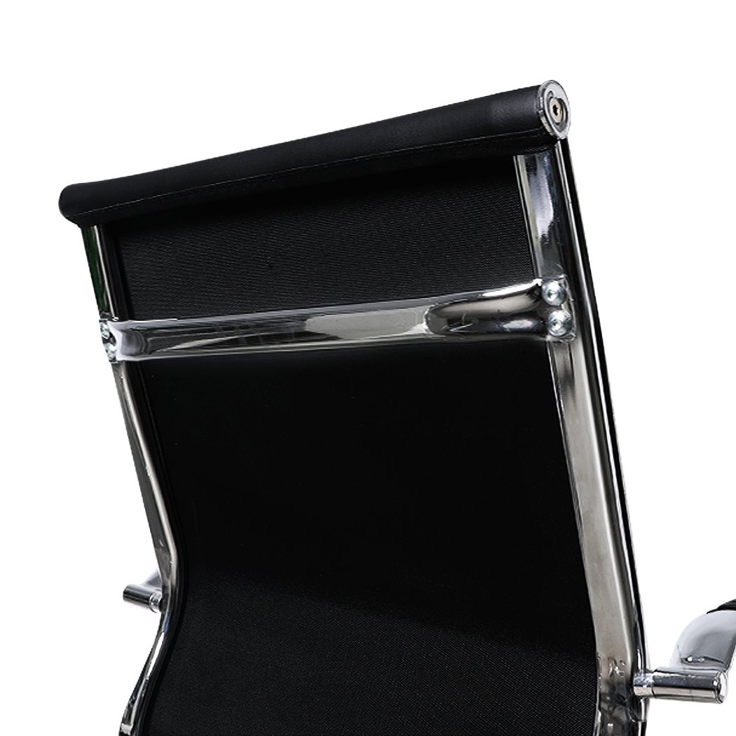 Stylish black PU leather office chair with chrome base and padded armrests, designed for comfort and mobility.