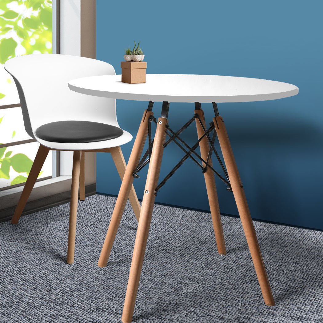 Modern round office dining table with a white MDF top and sturdy beech wood legs, perfect for meetings and casual gatherings.