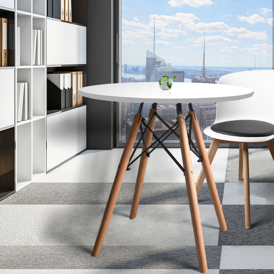 Modern round office dining table with a white MDF top and sturdy beech wood legs, perfect for meetings and casual gatherings.