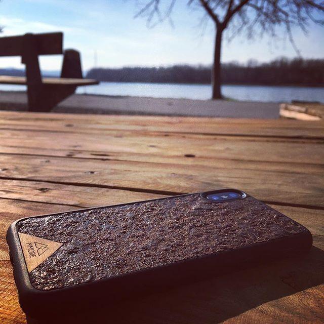 Organic Coffee Phone Case featuring a unique texture and aroma, held by a woman, showcasing its eco-friendly design.