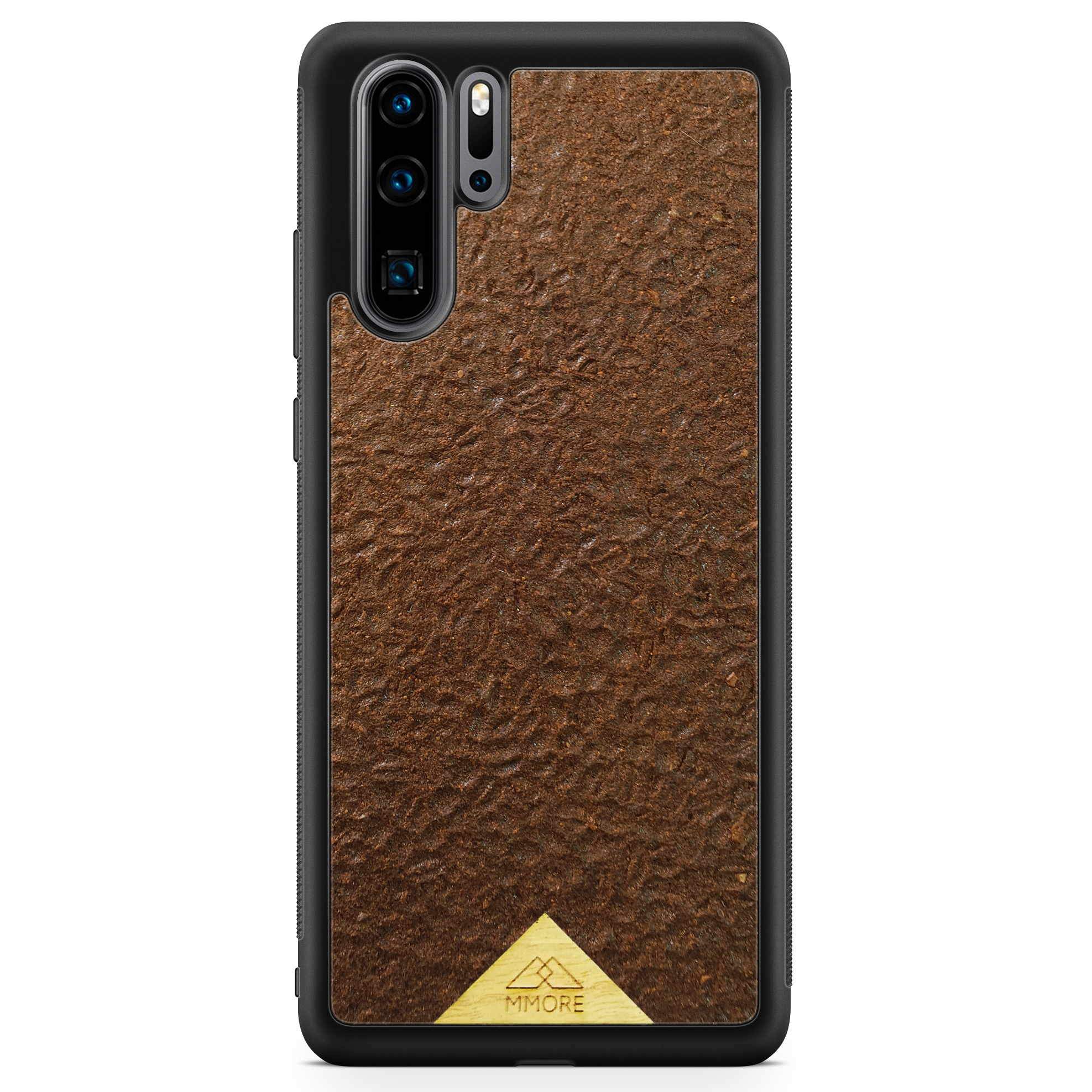 Organic Coffee Phone Case featuring a unique texture and aroma, held by a woman, showcasing its eco-friendly design.