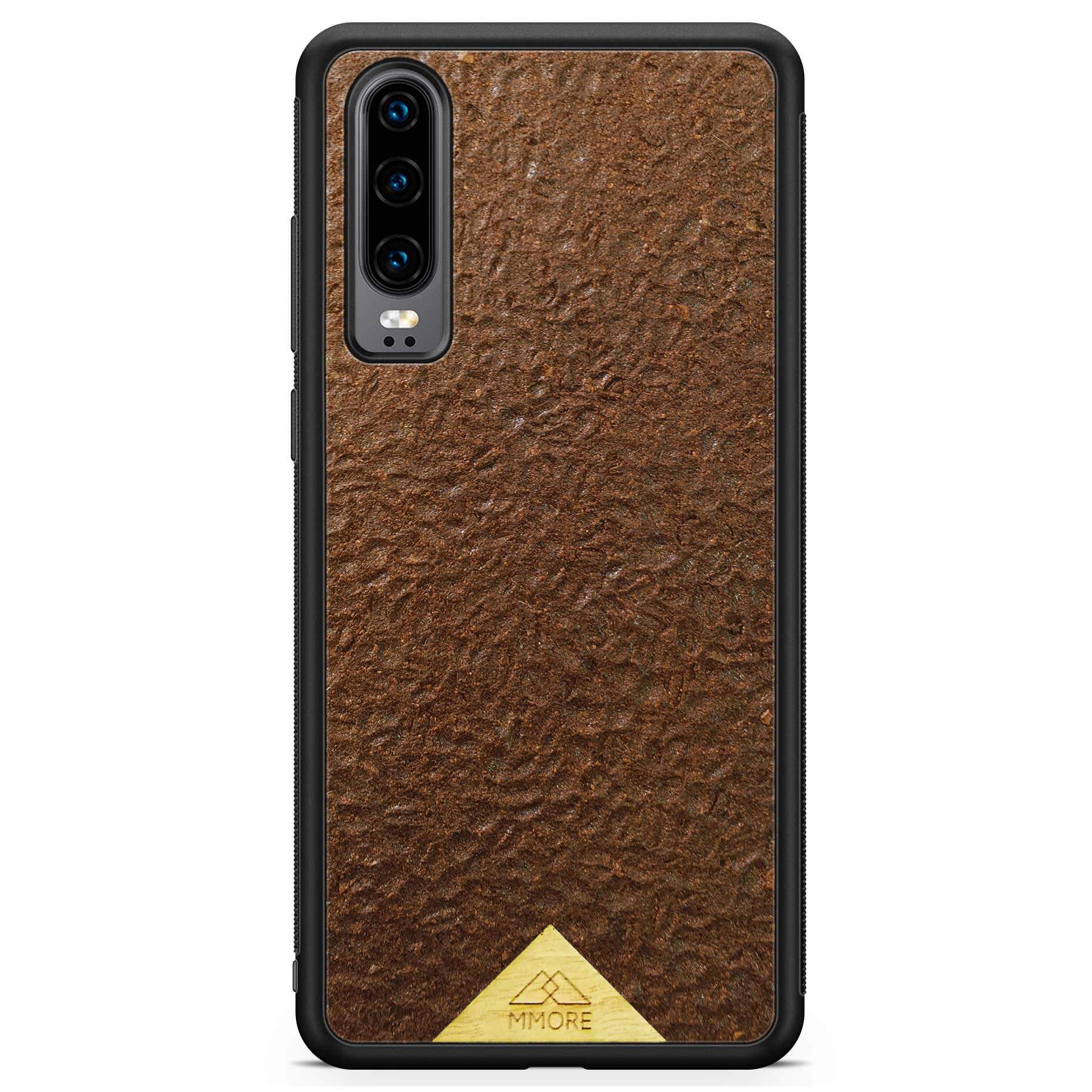 Organic Coffee Phone Case featuring a unique texture and aroma, held by a woman, showcasing its eco-friendly design.