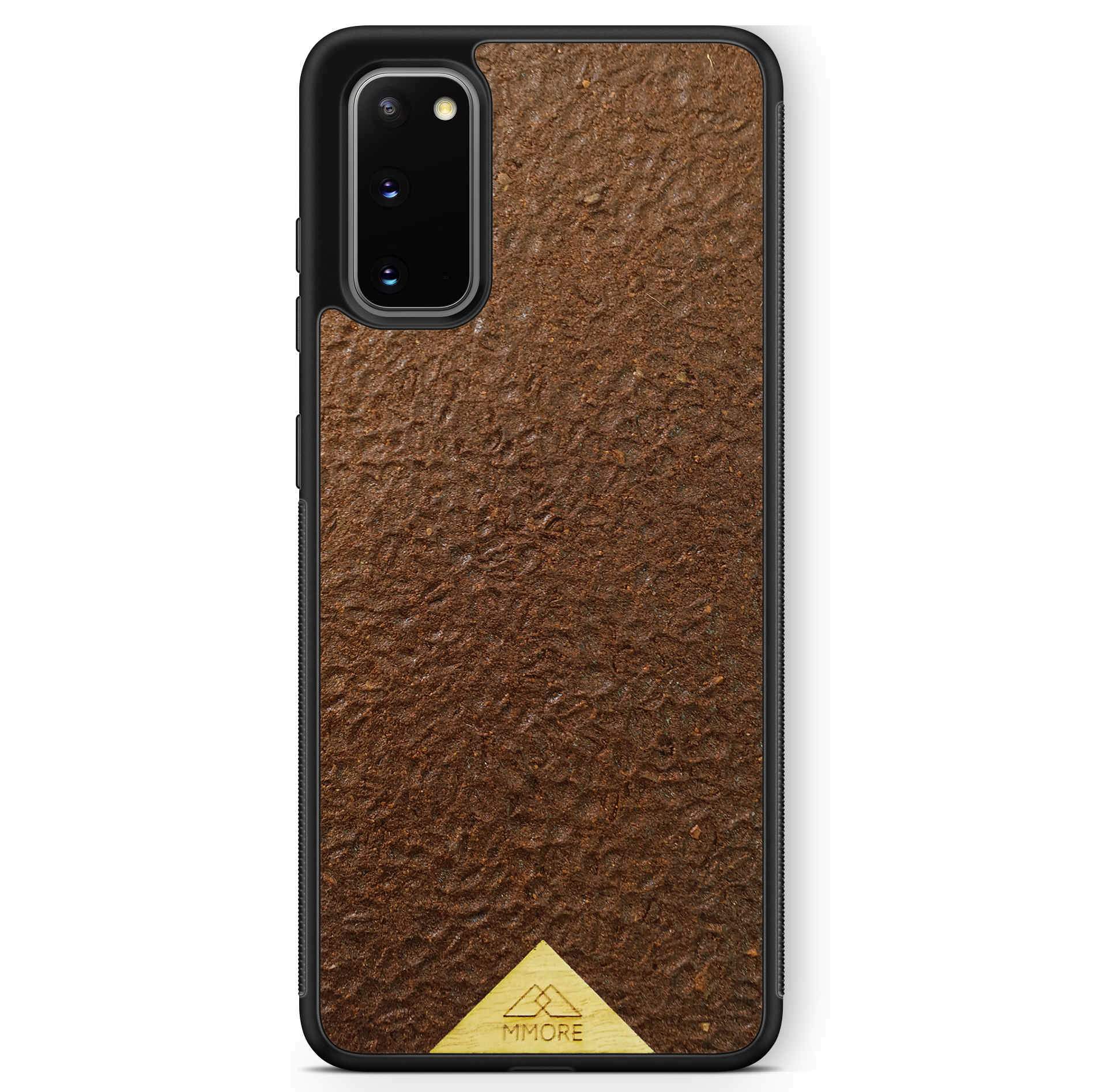 Organic Coffee Phone Case featuring a unique texture and aroma, held by a woman, showcasing its eco-friendly design.