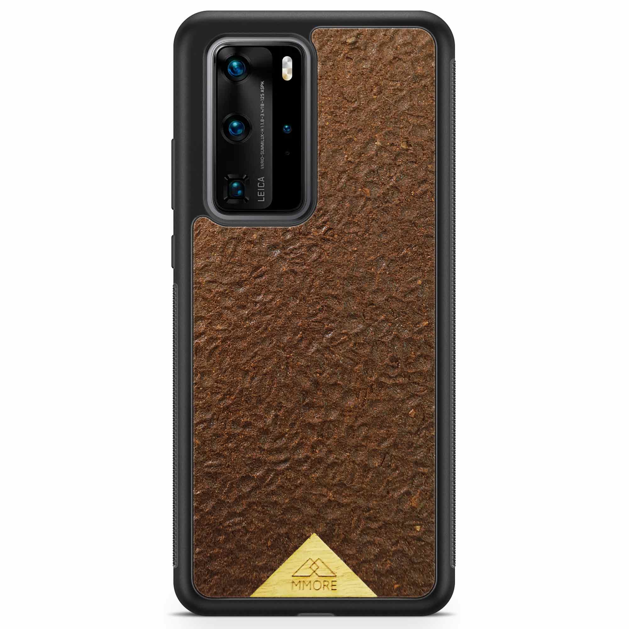 Organic Coffee Phone Case featuring a unique texture and aroma, held by a woman, showcasing its eco-friendly design.