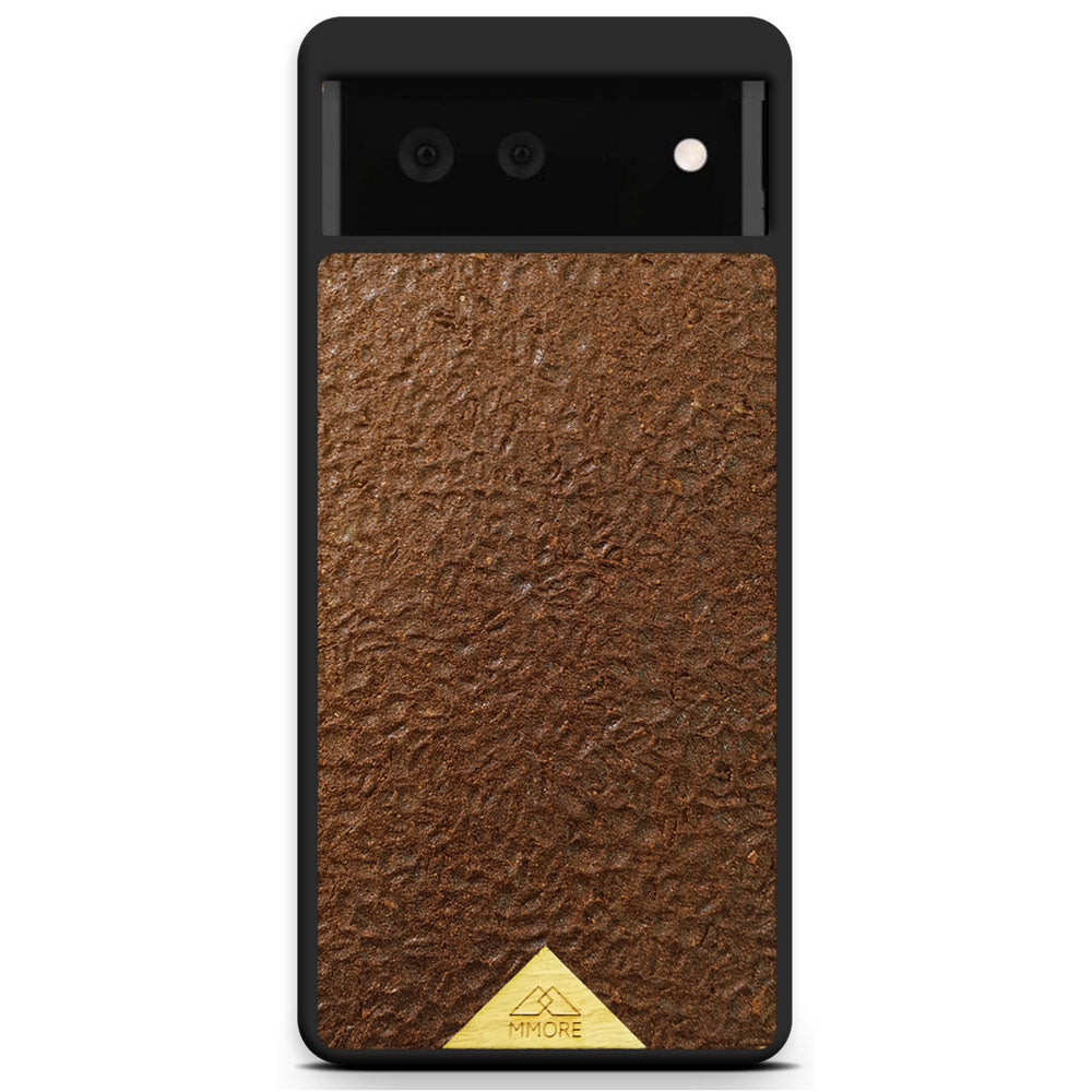 Organic Coffee Phone Case featuring a unique texture and aroma, held by a woman, showcasing its eco-friendly design.