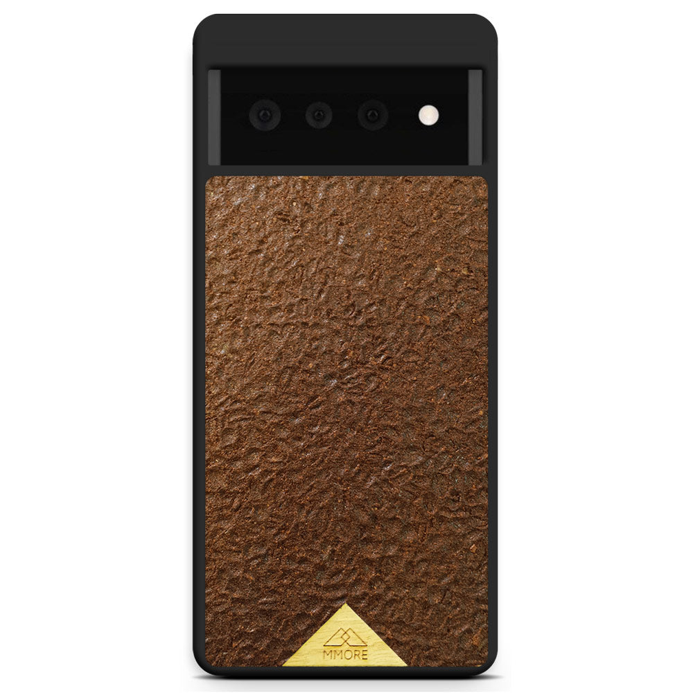 Organic Coffee Phone Case featuring a unique texture and aroma, held by a woman, showcasing its eco-friendly design.