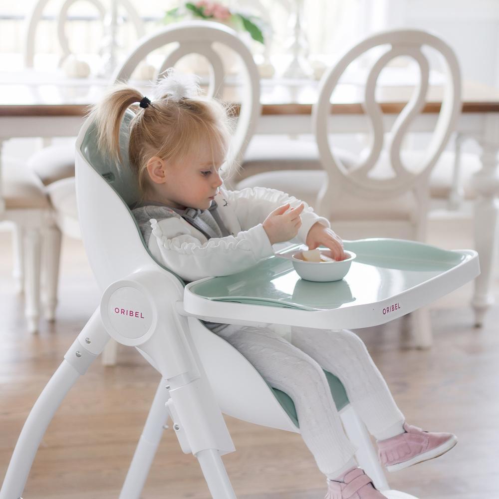 Oribel Cocoon Baby High Chair in slate color, showcasing its ergonomic design and adjustable features for infants and toddlers.