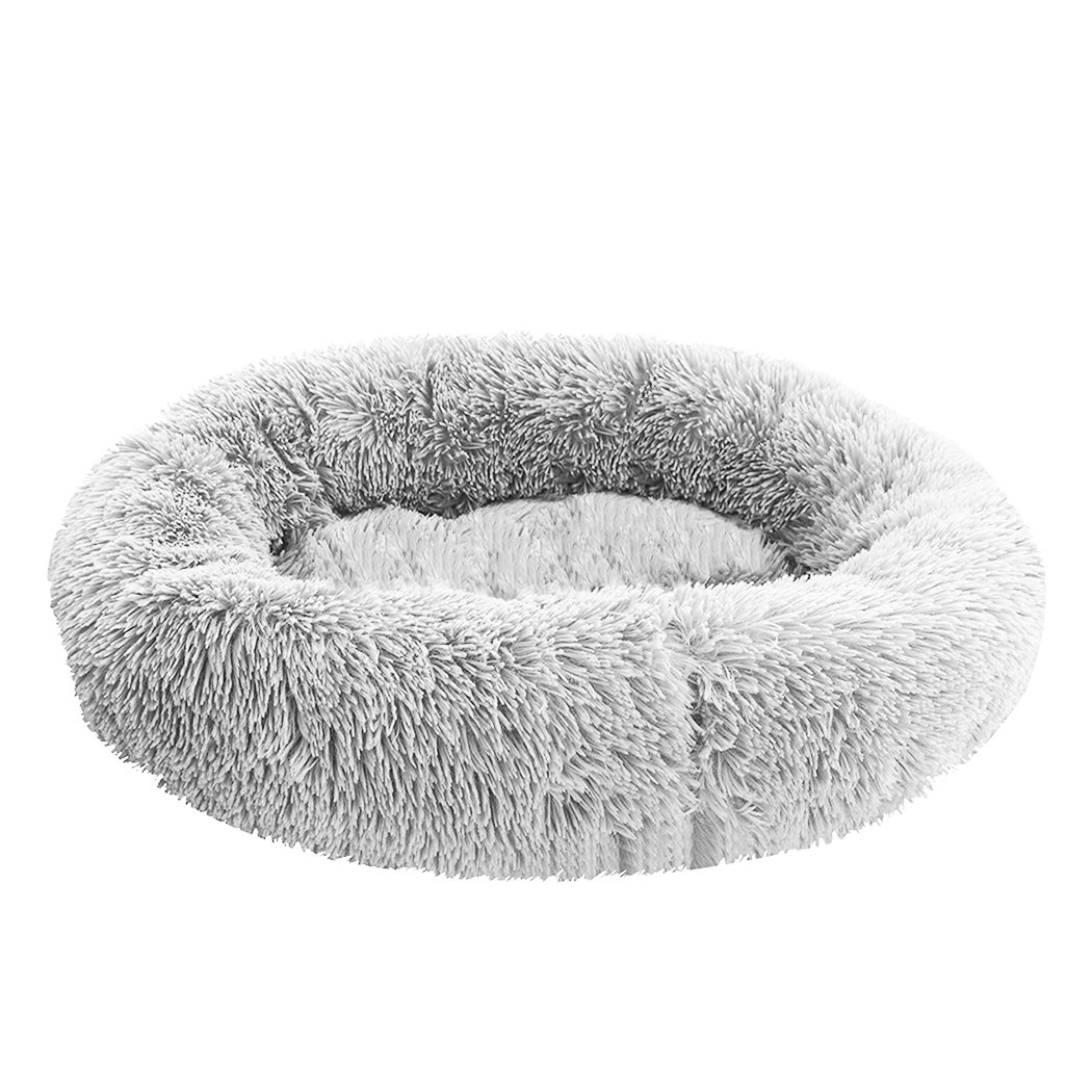 PaWz Pet Bed in light grey, donut-shaped design with plush surface and non-slip bottom, perfect for dogs and cats.