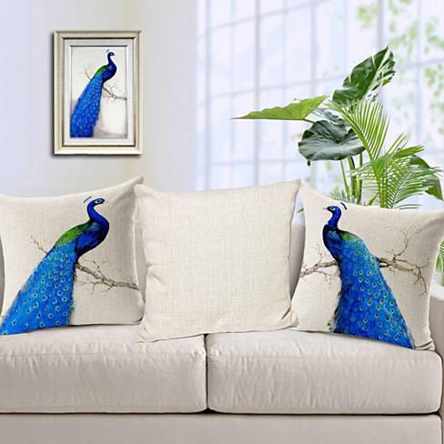 PEACOCK EXOTICA Cushion Covers featuring vibrant peacock designs in Royal Purple, Emerald Green, and Deep Turquoise on a soft cotton linen fabric.