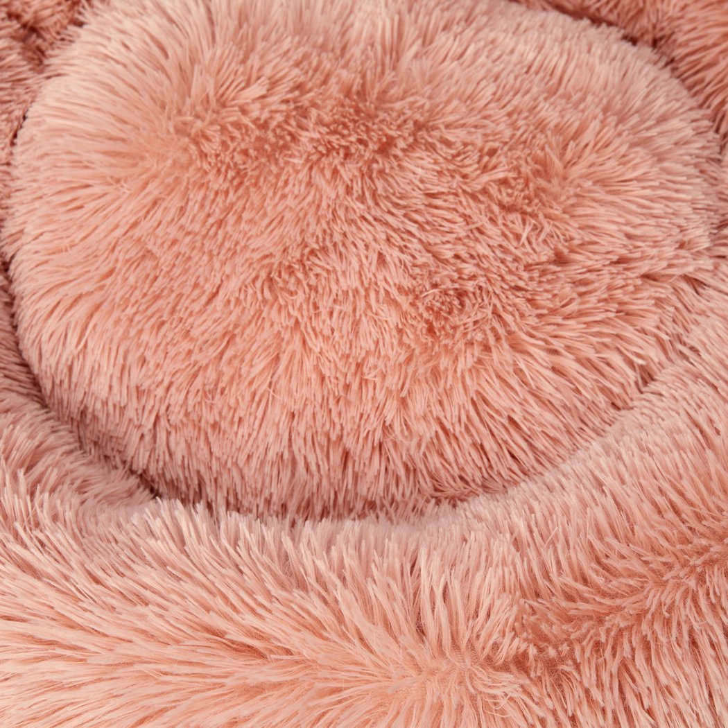 XXL Pink Donut Pet Bed designed for deep sleeping and calming comfort for cats and dogs.