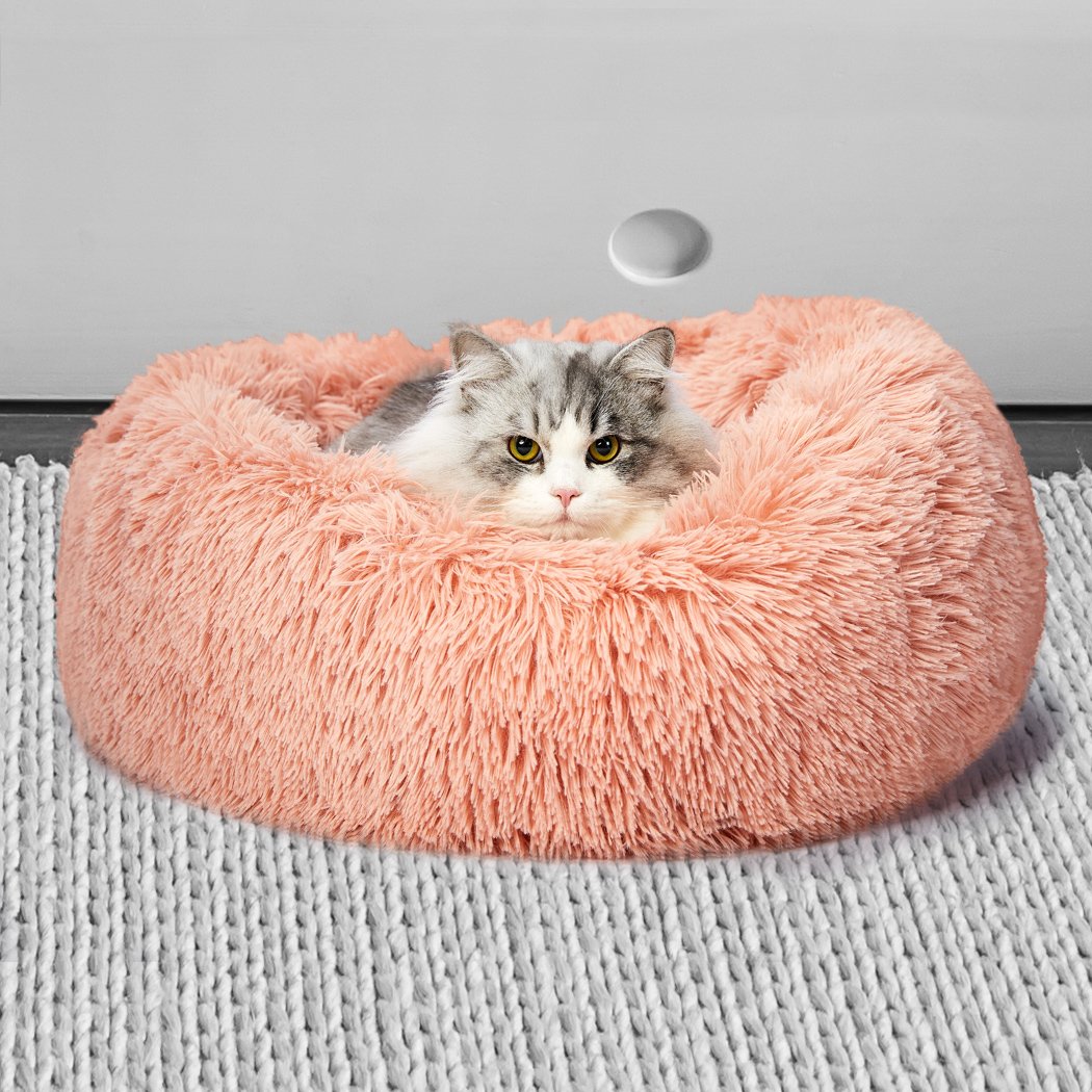 XXL Pink Donut Pet Bed designed for deep sleeping and calming comfort for cats and dogs.