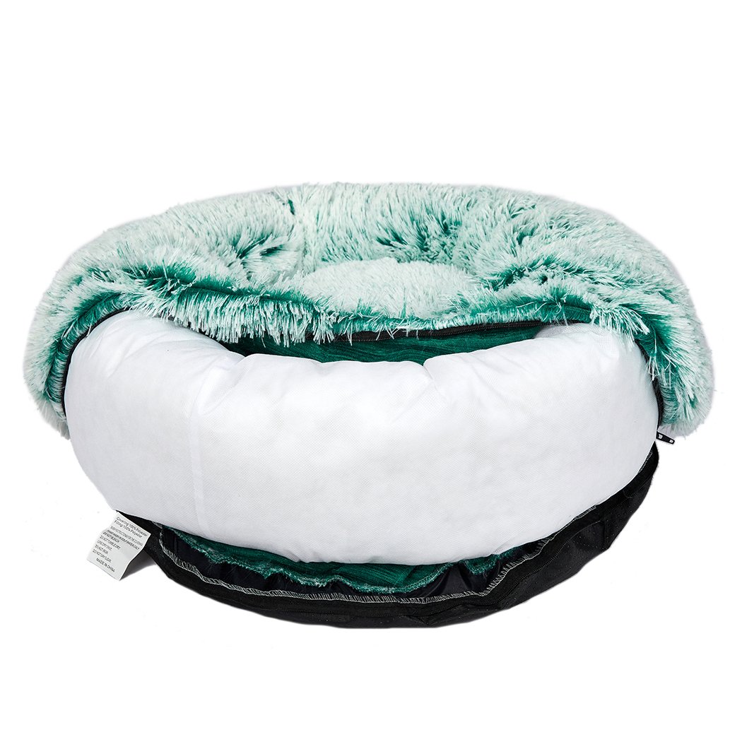 Teal XL donut-shaped pet bed with plush surface and raised rim, designed for dogs and cats to provide comfort and security.